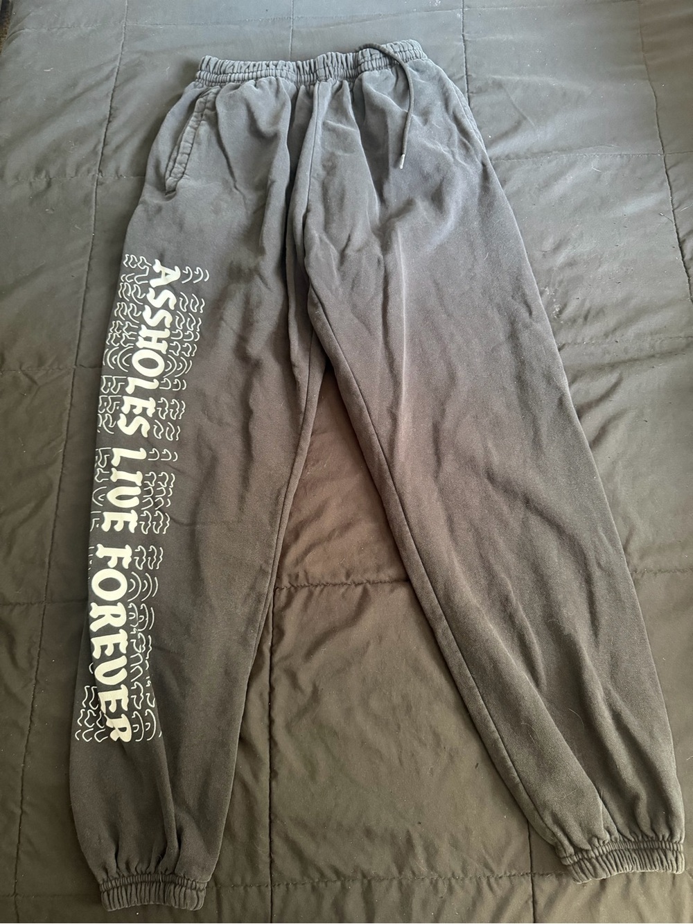Black Graphic Jogger Sweatpants - 'ASSHOLES LIVE FOREVER'